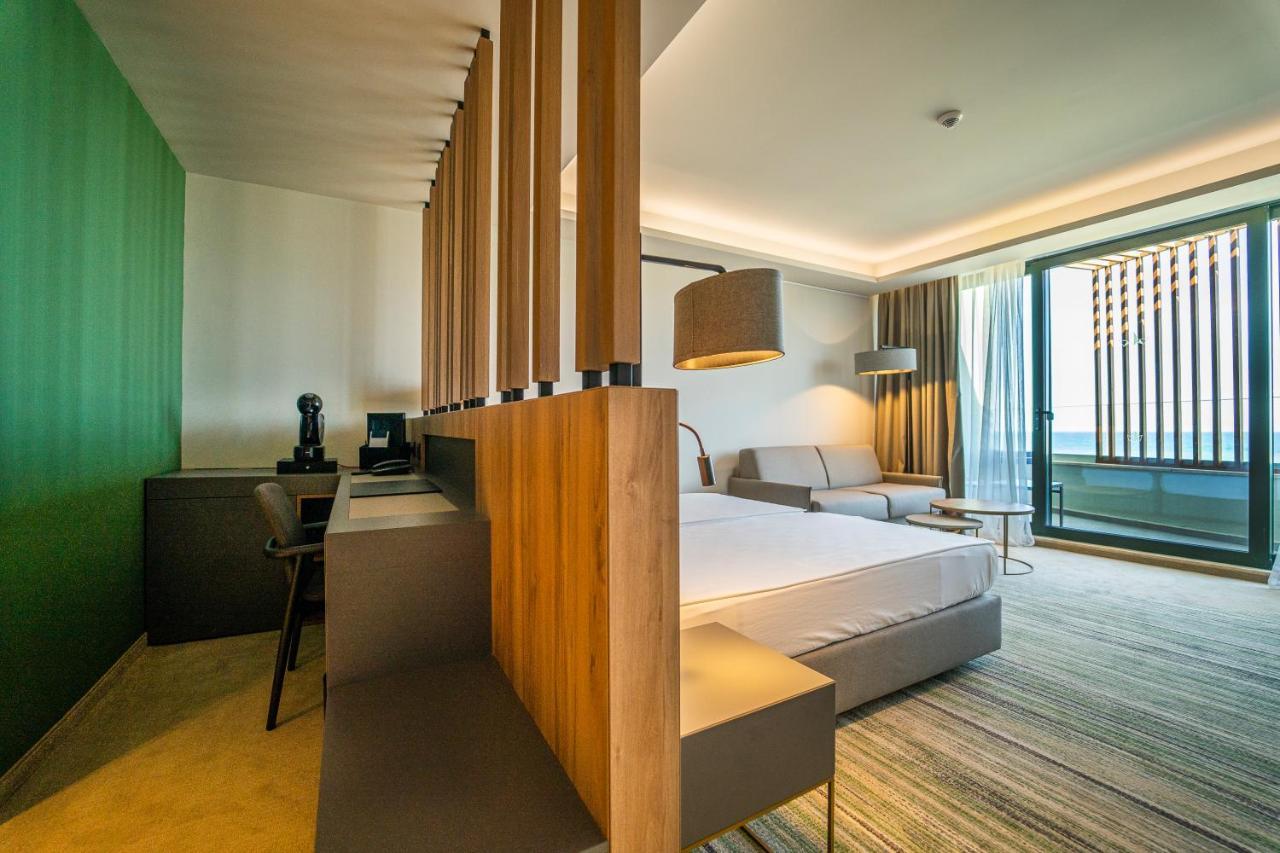 Double Room with Partial Sea View (2 Adults + 2 Children) - Free Parking & Beach Access,1011867712:JPEG