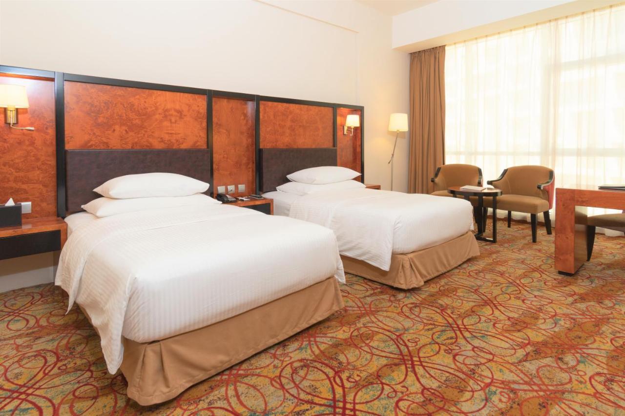 Pool View King Room complimentary shuttle to DXB Airport Terminal 1 & 3
