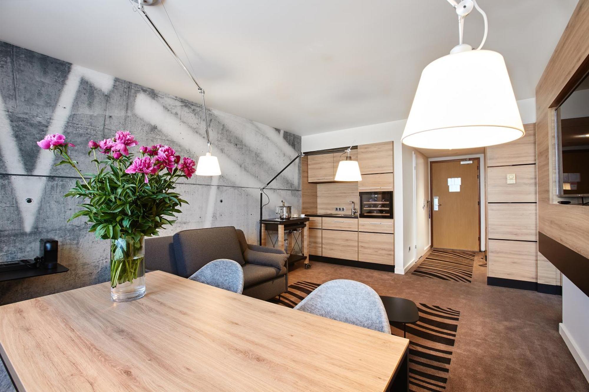 Apartament typu Superior Suite z łóżkiem typu queen-size i aneksem kuchennym