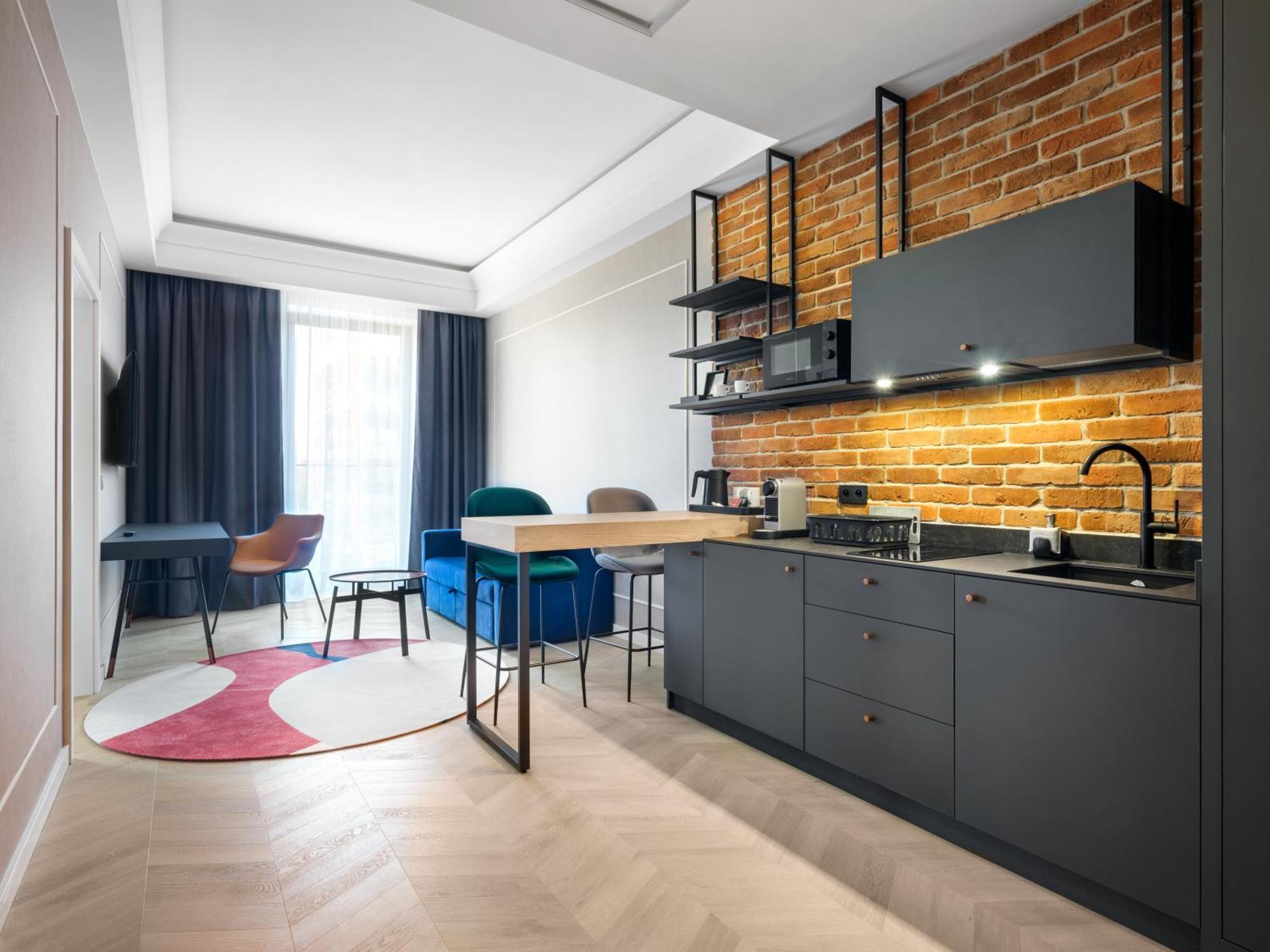 Apartament typu Superior Suite z łóżkiem typu king-size oraz sofą