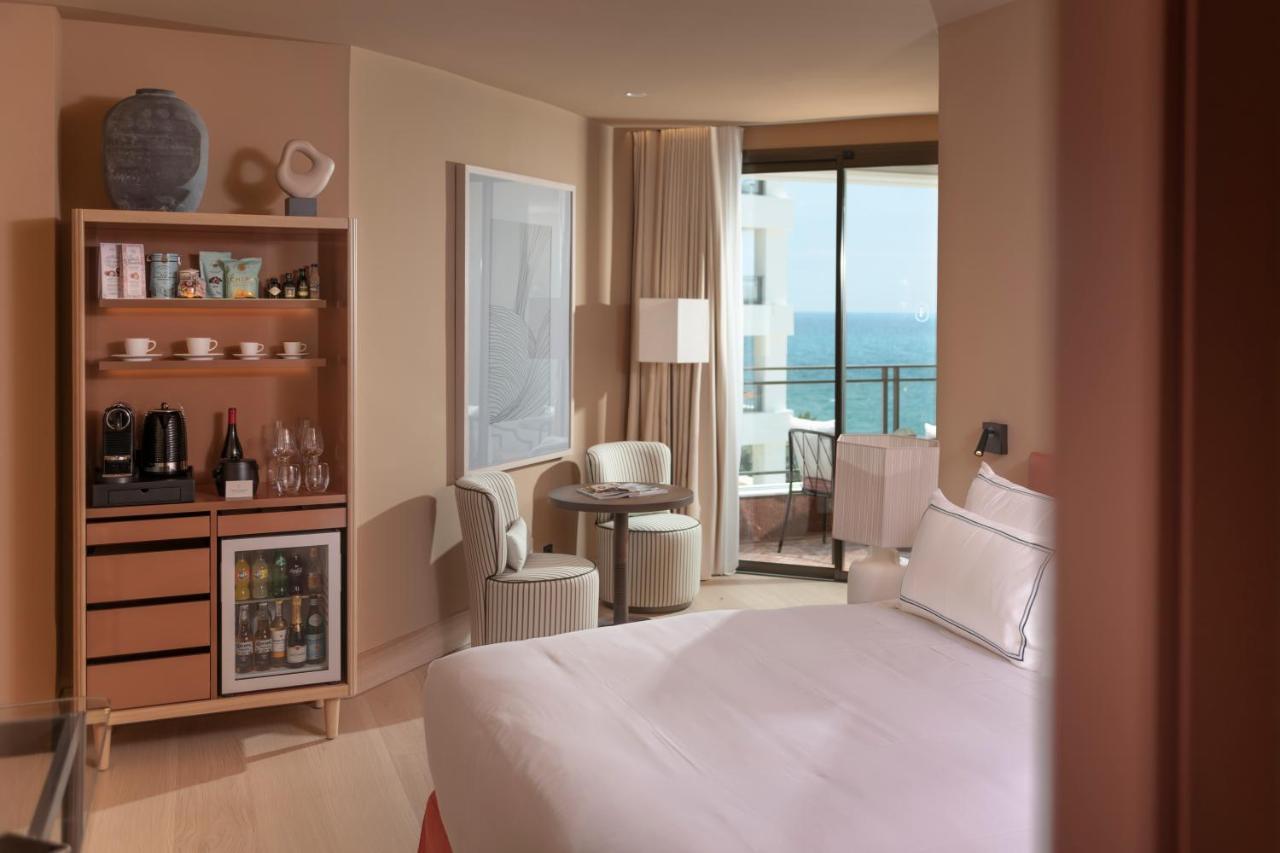 Double or Twin Room with Partial Sea View,1554997132:JPEG