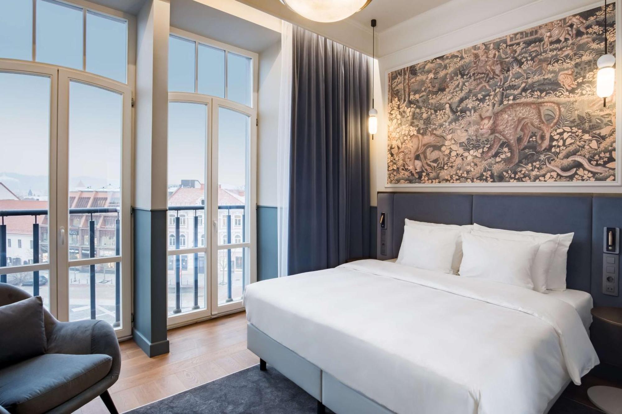 Collection Room with Balcony and Old Town View,1516329247:JPEG