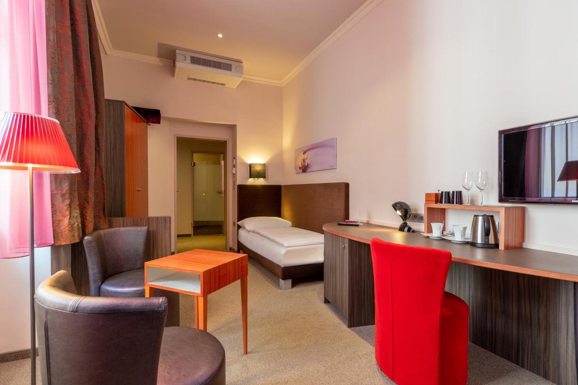 Deluxe Triple Room Garden View
