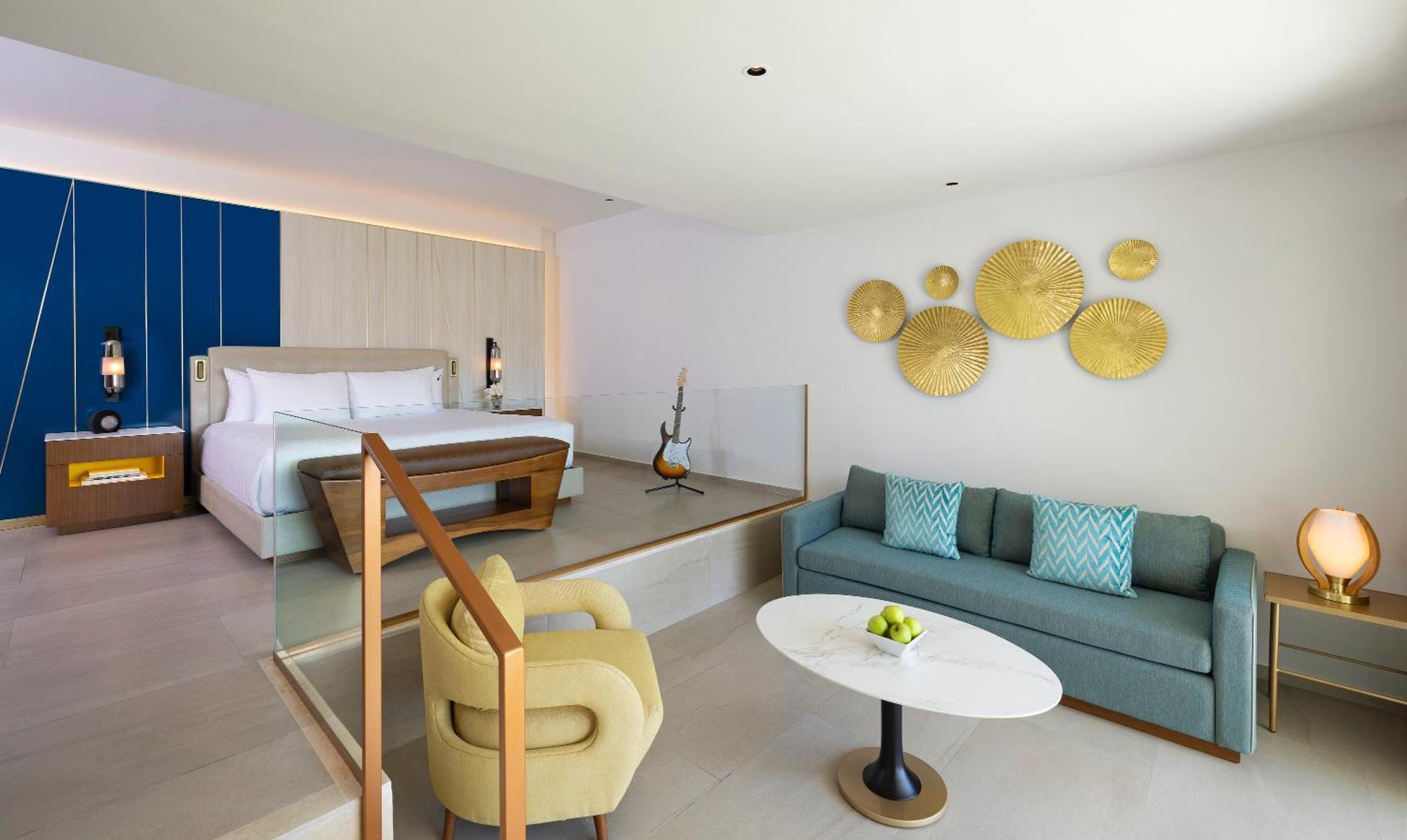 Apartament typu Caribbean Suite z łóżkiem typu king-size i sofą