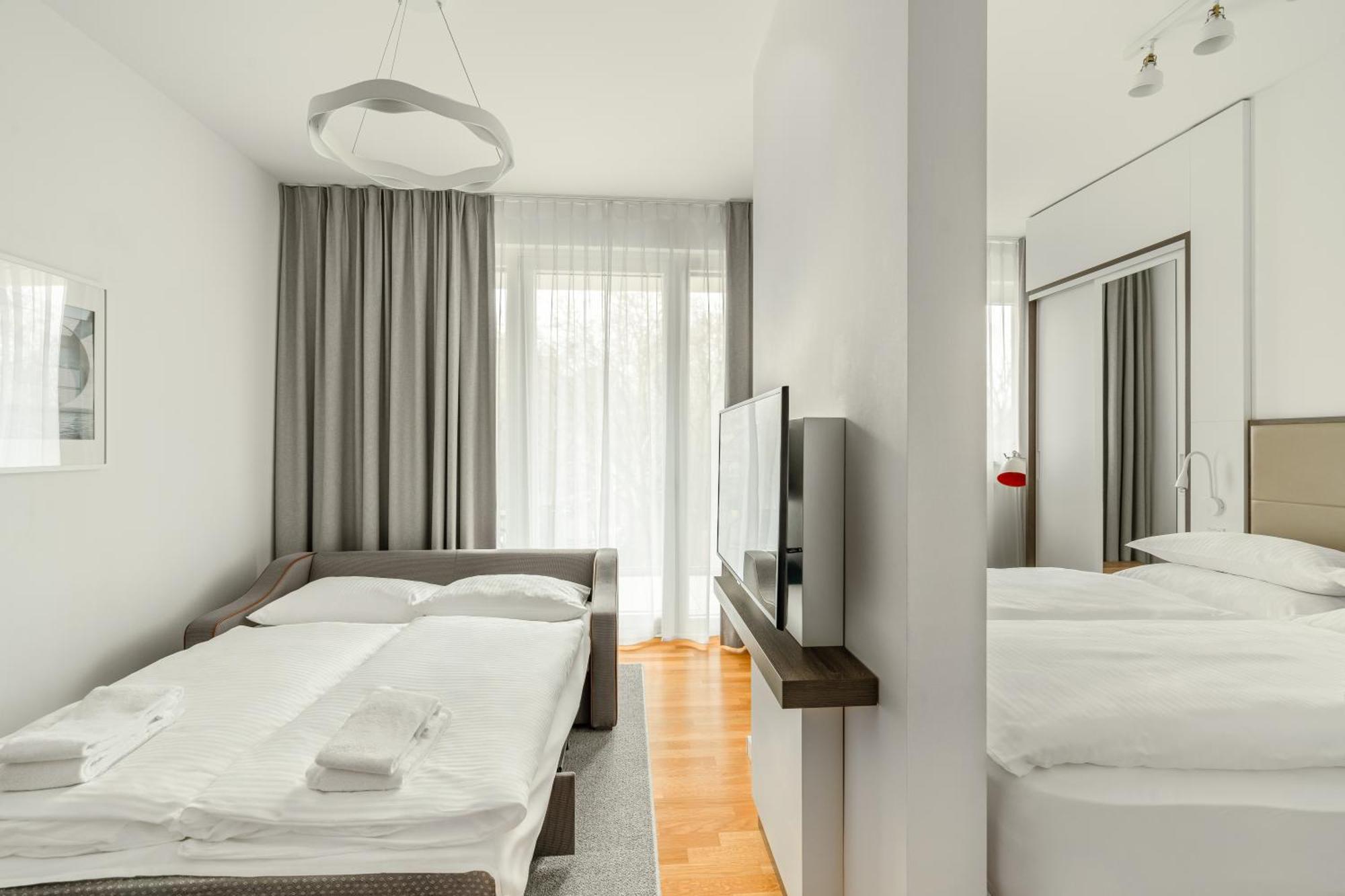 Studio z łóżkiem typu king-size i rozkładaną sofą