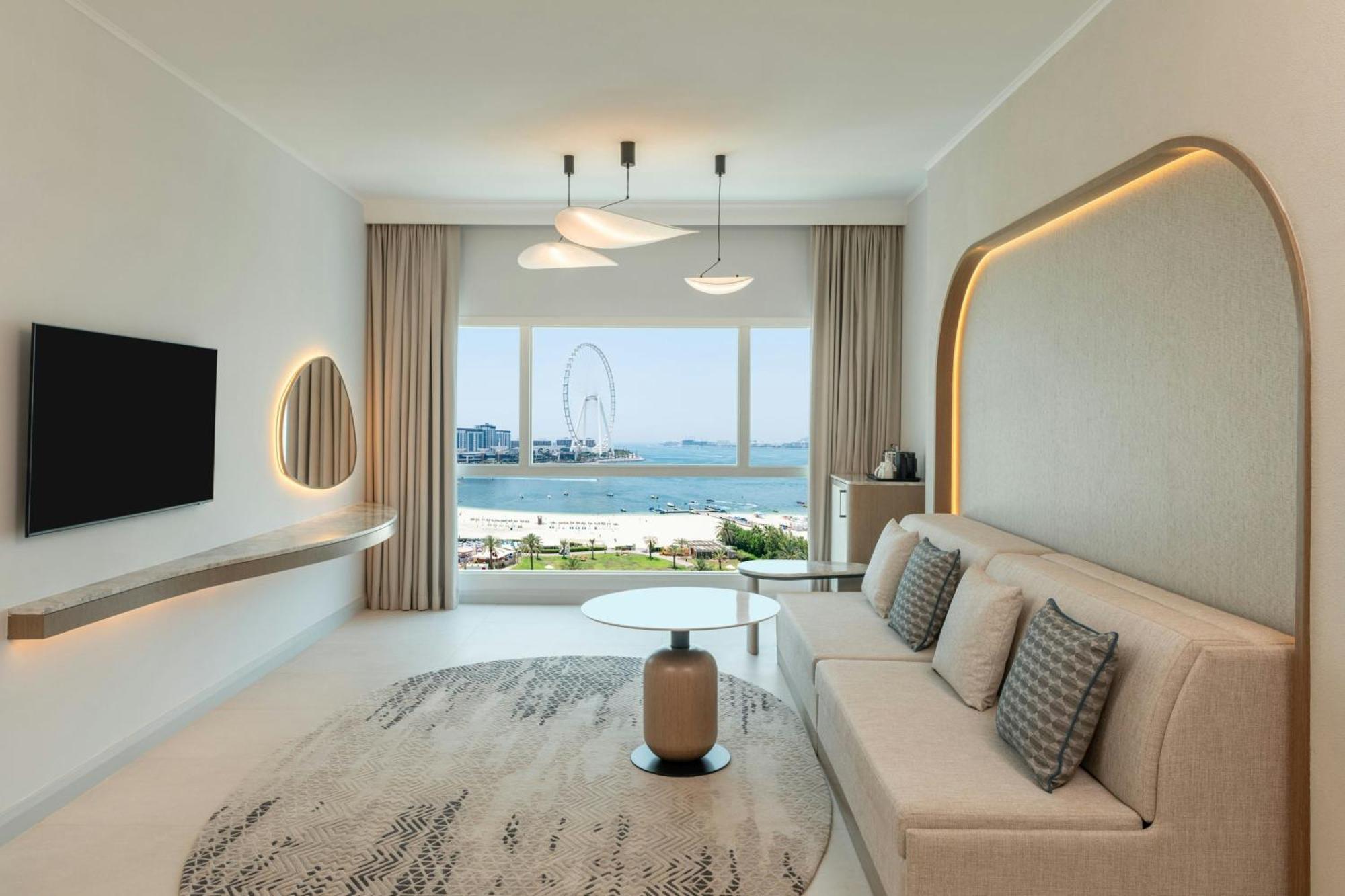 Premium Suite Sea View Including Lounge Access Afternoon Tea Evening Cocktail Hours Soft Refreshments & Canapes Private beach Access