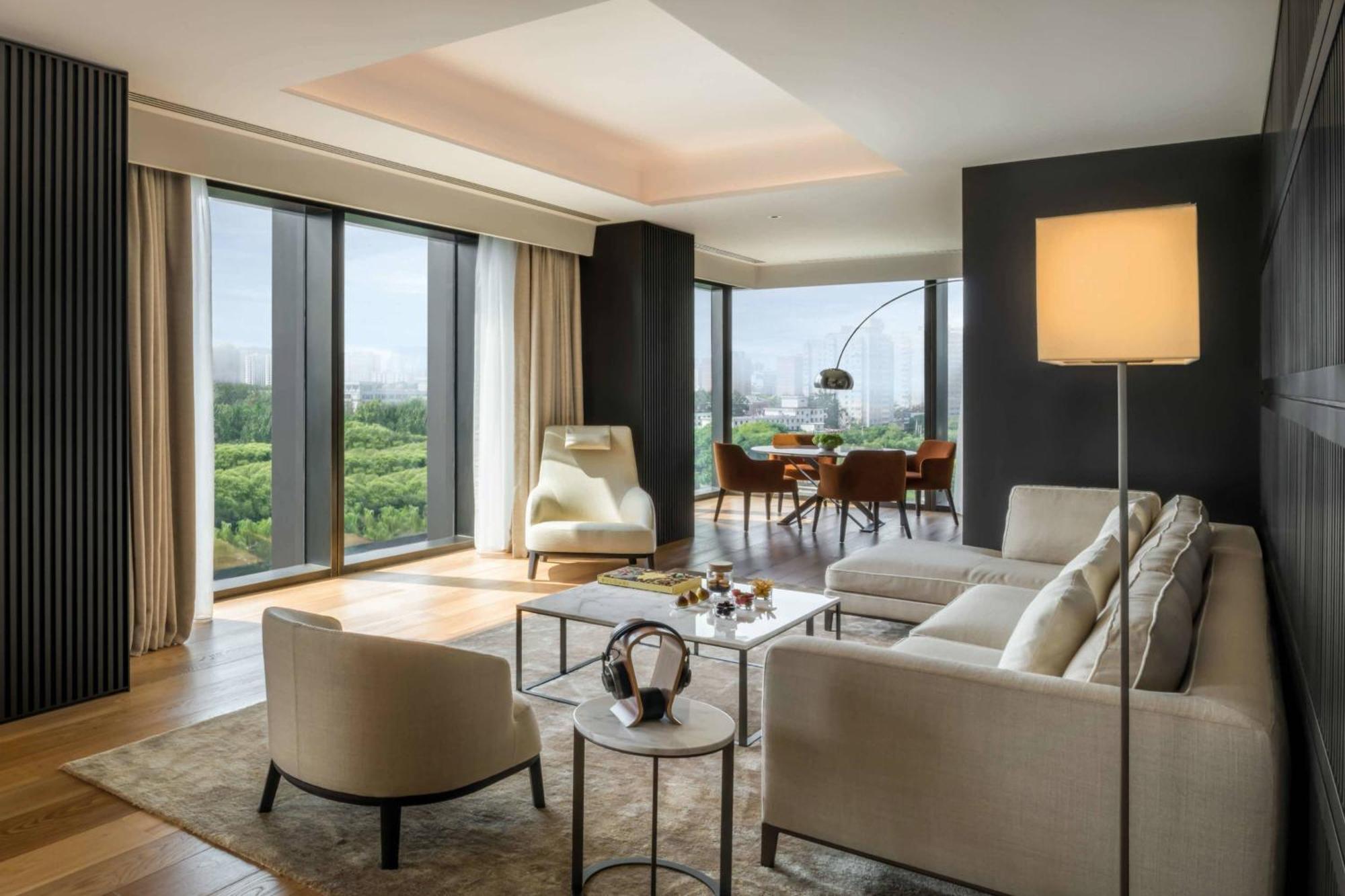 One-Bedroom Deluxe Suite Liangma River View Minibar soft drinks & beers Two-way limousine services are available between the hotel airport or train station Beijing unlimited laundry service
