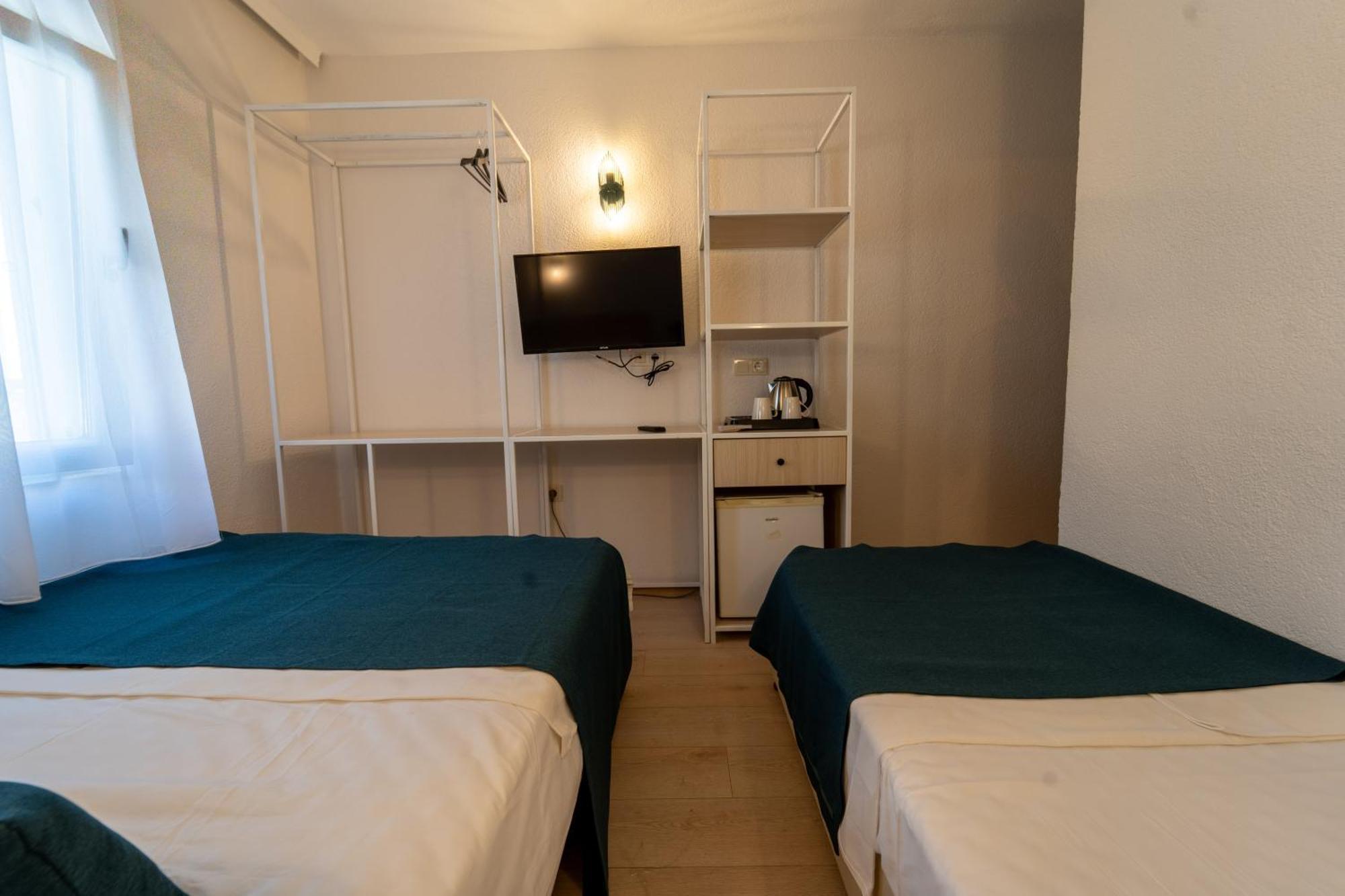 Pokój trzyosobowy z widokiem na miasto