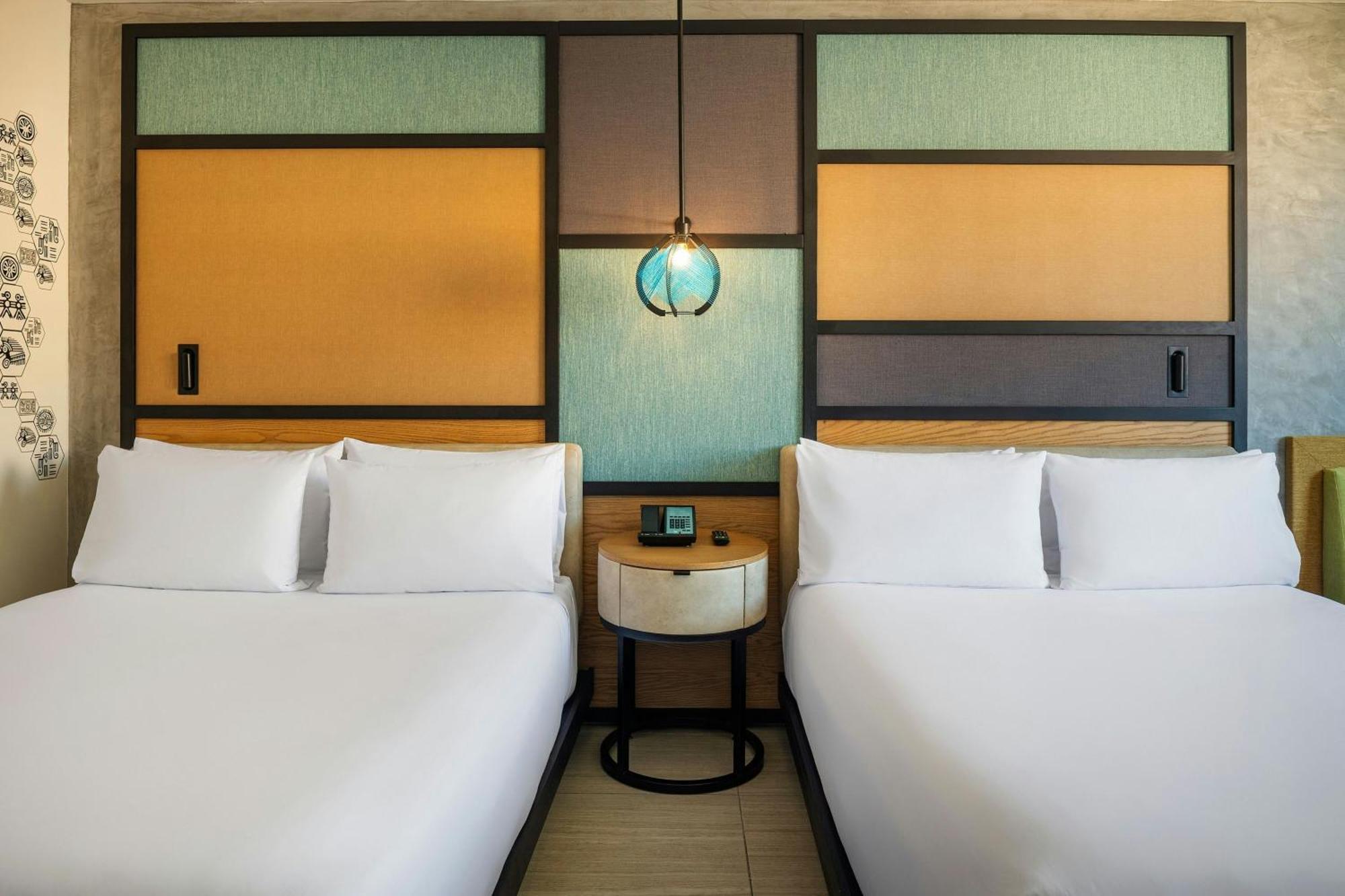 Aloft Ocean View Guest room 2 Queen Complimentary open bar