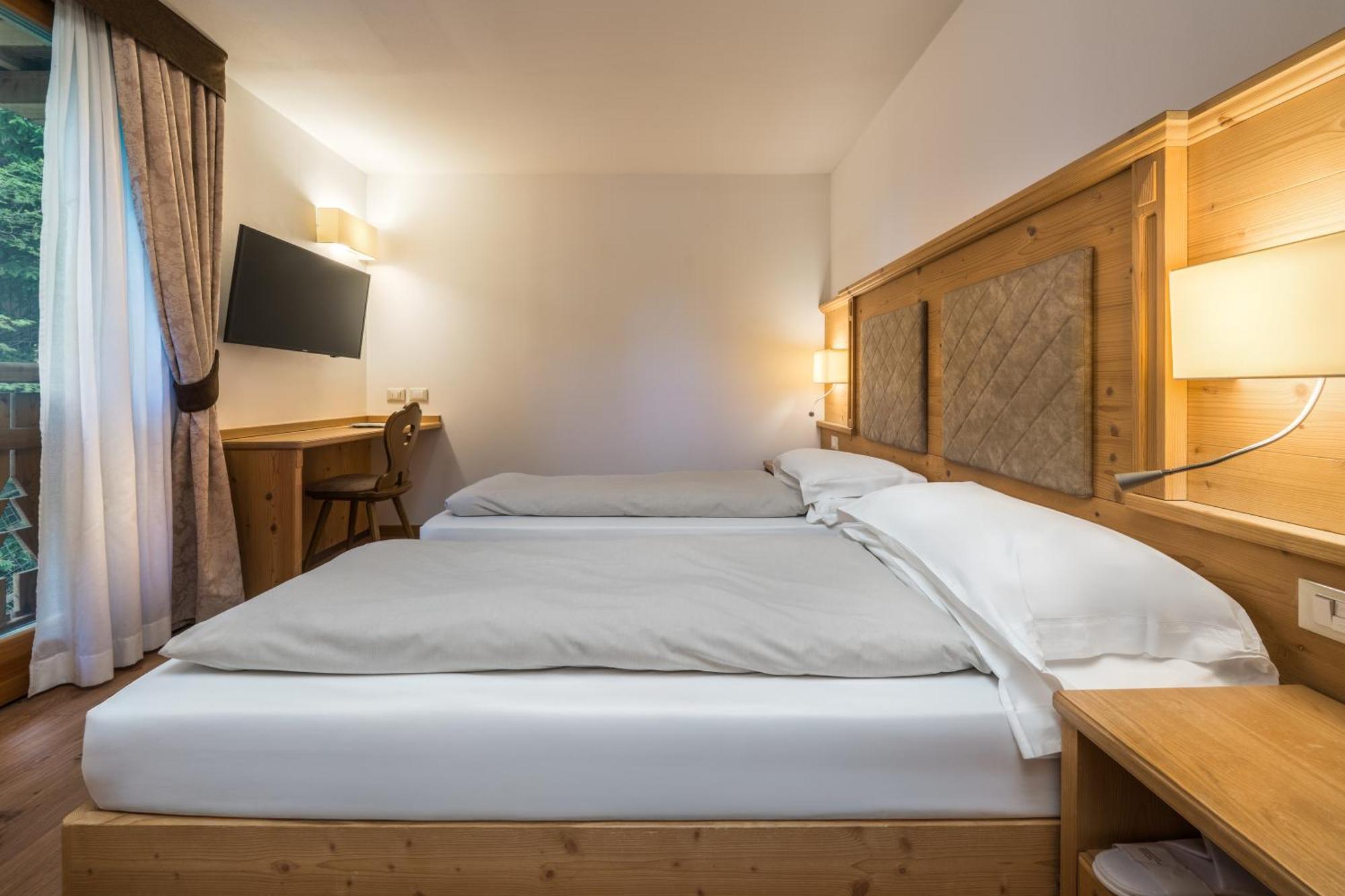 Apartament typu Suite z 2 sypialniami i balkonem – aneks