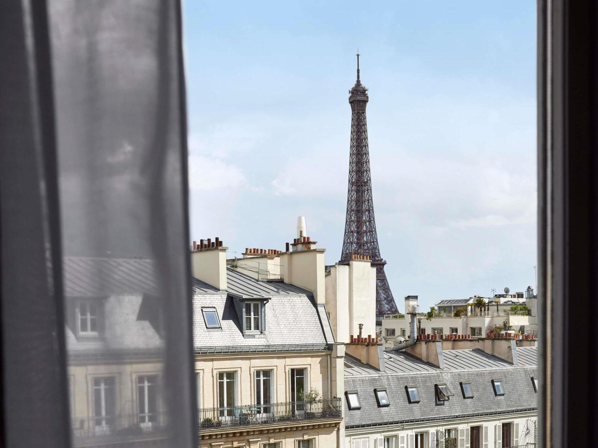 Two-Bedroom Eiffel Family Suite One King Bed One Queen Bed Eiffel Tower View