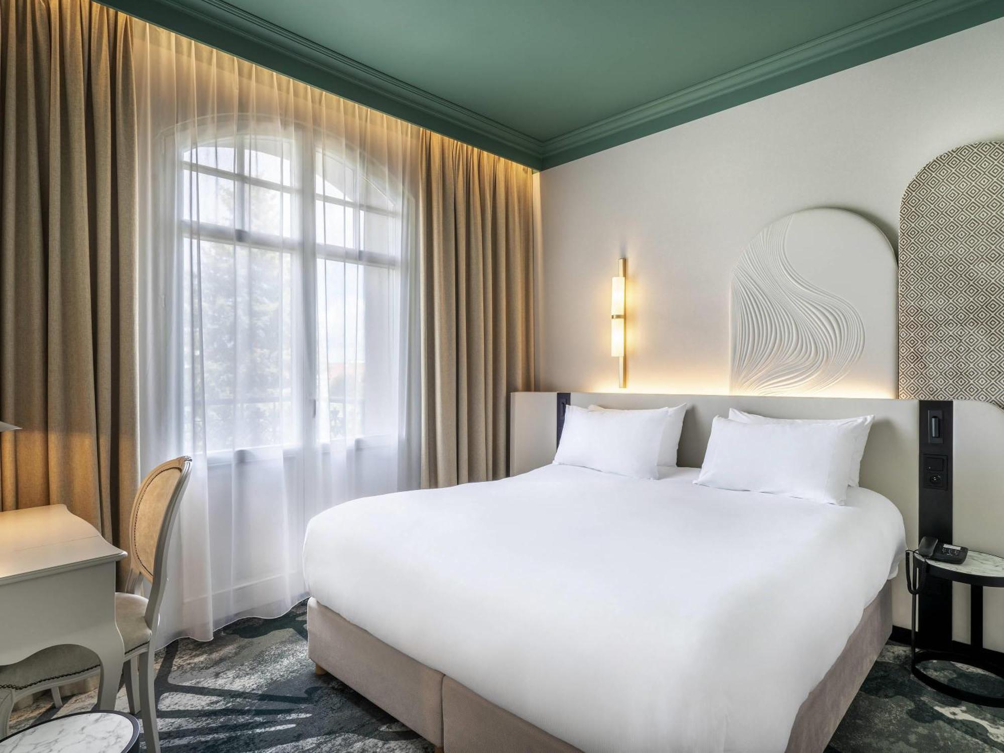 Apartament typu Executive Suite z łóżkiem typu king-size i sofą