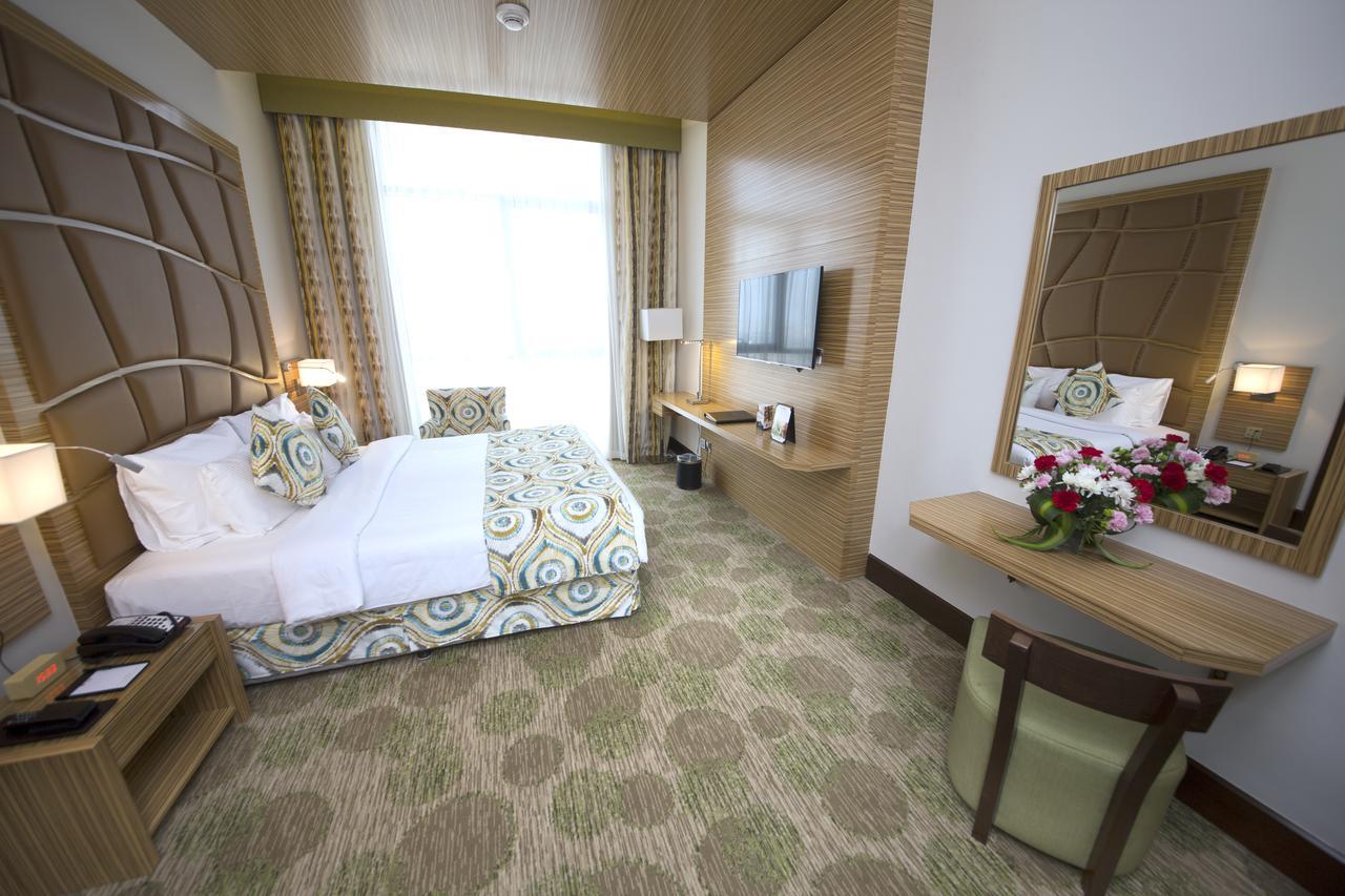 Deluxe King Room - Non-Smoking,1219557385:JPEG