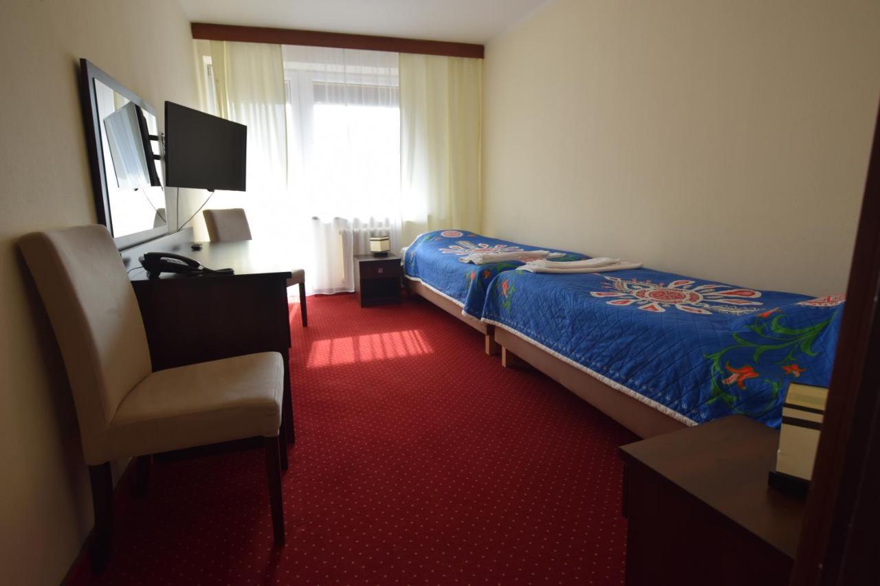 Pokój z 2 łóżkami pojedynczymi i balkonem