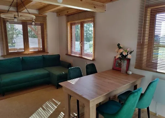 KALINOWY SAD DOMKI z JACUZZI i SAUNĄ Mikołajki