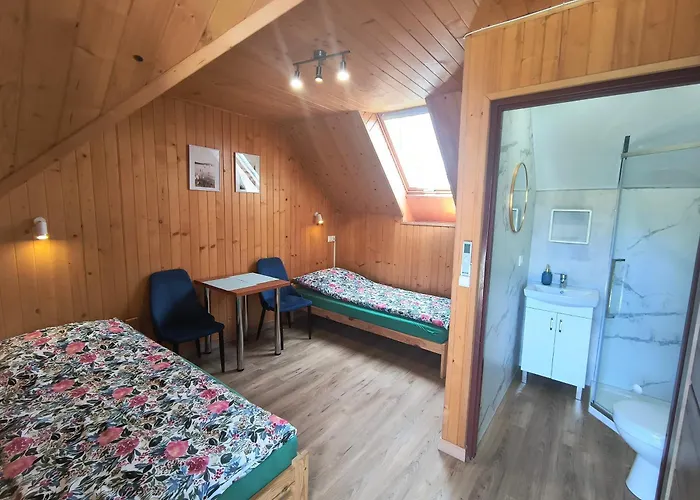 Apartamenty, Domki, Pokoje Ewelka Okuninka